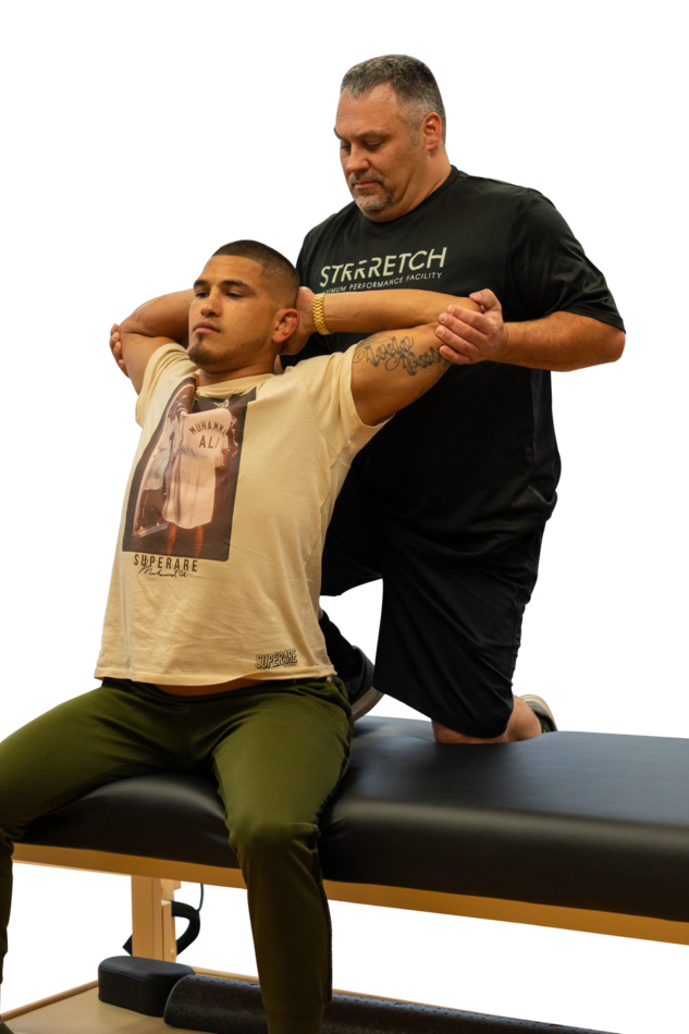 ASA instructor guiding a client through an assisted upper-body stretch